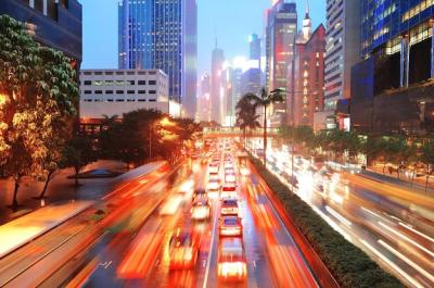 Busy Hong Kong Street Traffic and Dusk Skyscrapers – Free Download