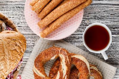 Turkish Bagel with Tea and Bread on Wooden Surface – Free Download