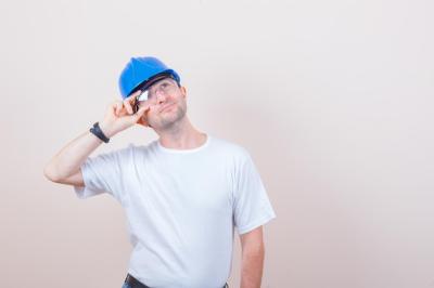 Hopeful Construction Worker in T-Shirt and Helmet – Free Stock Photo for Download