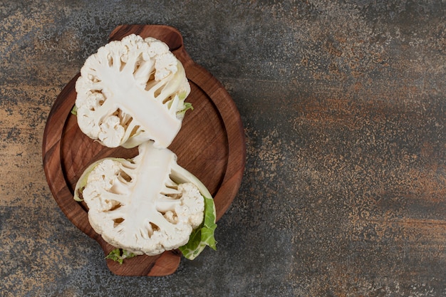 Cauliflower Sliced in Half on Marble Surface – Free Download