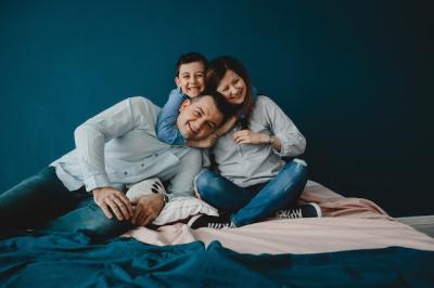 Young Parents and Their Son Relaxing on the Bed – Free Stock Photo, Download for Free