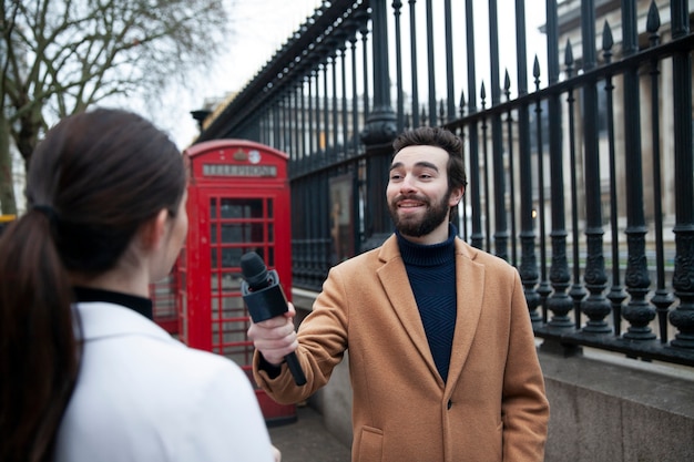 Smiley Man Holding Microphone – Free Download