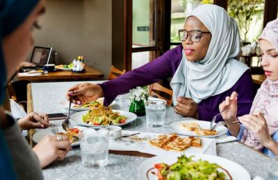 Islamic Women Friends Enjoying a Happy Meal – Free Download