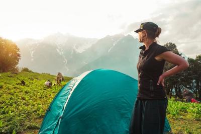 Young Caucasian Female Enjoying Sunlight by a Tent – Free Stock Photo, Download for Free