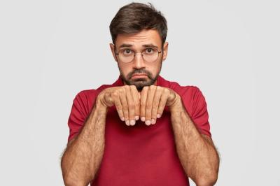 Miserable Handsome Unshaven Male Imitating a Puppy – Free Stock Photo, Download for Free