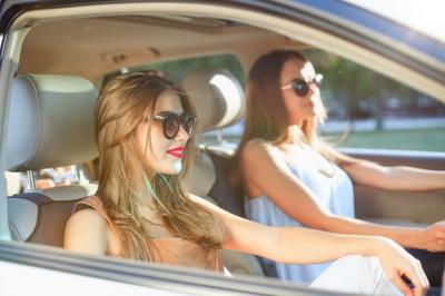 Smiling Young Women in a Car – Free to Download Stock Photo