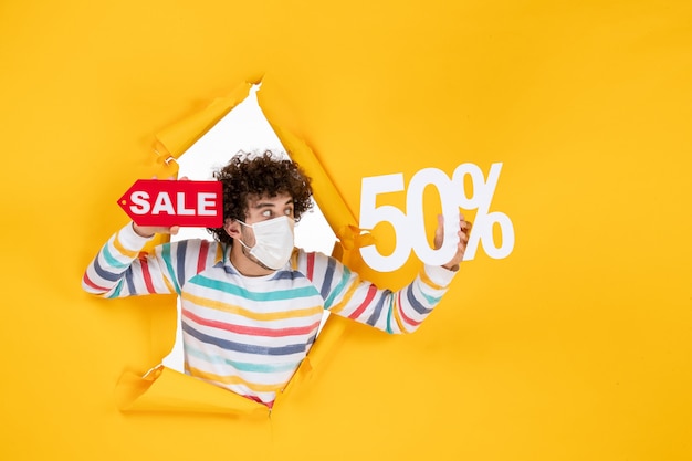 Young Male in Mask Holding Yellow Shopping Bag – Free Stock Photo, Download Free