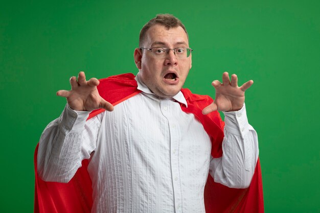 Slavic Superhero Man in Red Cape Roaring with Paws Gesture – Free Download