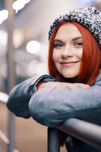 Beautiful Smiling Girl Enjoying Night Festivities in European City – Free Stock Photo for Download