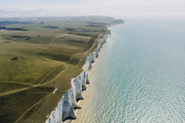 Stunning View of the White Cliffs of Dover by the Sea – Free Download