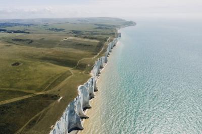 Stunning View of the White Cliffs of Dover by the Sea – Free Download