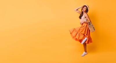 Carefree Female Model Dancing in Bright Skirt – Free Stock Photo, Download Free