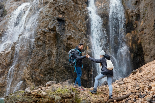 Couple Hiking in Nature – Free Stock Photo for Download