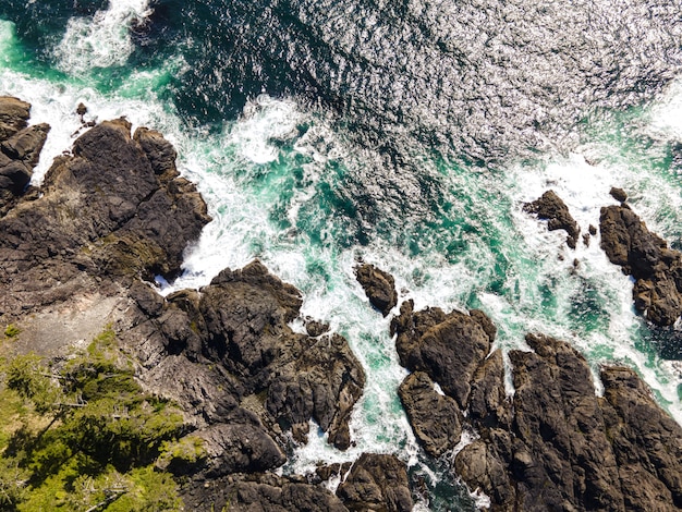 Aerial Shot of a Sea with Rocky Stones – Free Download