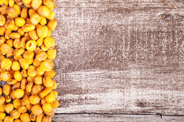 Delicious Salty Roasted Corn on Wooden Background – Free Stock Photo for Download