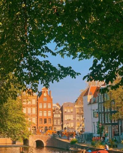 A Street With Buildings and a Sign Saying “The Word” – Free Stock Photo Download