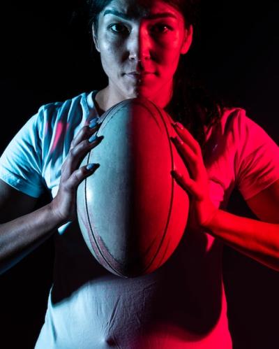 Female Rugby Player Holding Ball – Free Stock Photo for Download