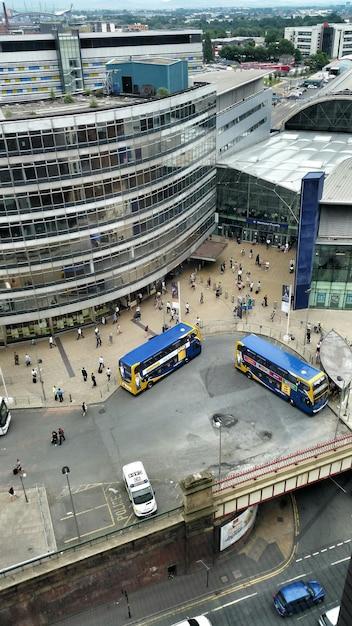 High Angle View of Buses and People in the City – Free Stock Photo for Download