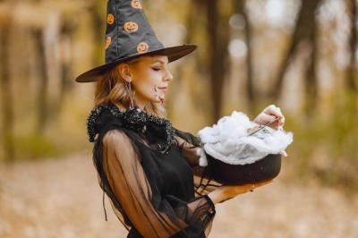 Blonde Young Girl Witch in Forest on Halloween â Free Stock Photo for Download