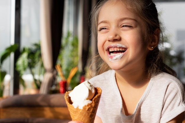 Girl Enjoying Ice Cream – Free Stock Photo for Download