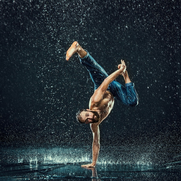 The Male Break Dancer Performing in Water – Free Download