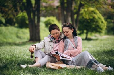 Grandmother, Mother, and Daughter Enjoying a Picnic in the Park – Free Download