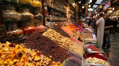 A Bustling Market Filled with Colorful Spices and Diverse Goods – Free Download