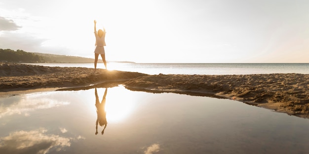 Woman Posing Outdoors with Water – Free Download