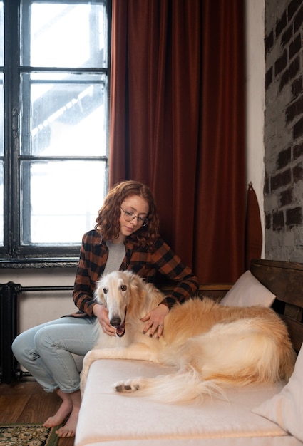 Woman with Cute Greyhound Dog – Free Stock Photo for Download