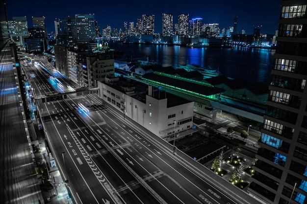 Illuminated City Buildings at Night – Free Download, Download Free Stock Photo