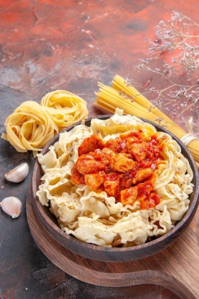 Delicious Chicken and Dough Pasta Dish on Dark Surface – Free Stock Photo, Download for Free