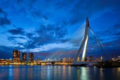 Stunning View of Erasmus Bridge and Rotterdam Skyline – Free Download