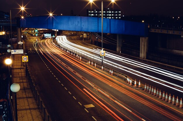 High Angle View of Light Trails on Road at Night – Free Stock Photo for Download