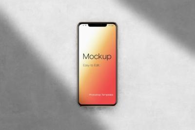 Phone Device Mockup on Wall Texture Background with Shadow – Free to Download