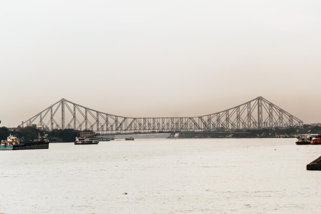 Suspension Bridge Over Sea Against Clear Sky – Free Stock Photo for Download