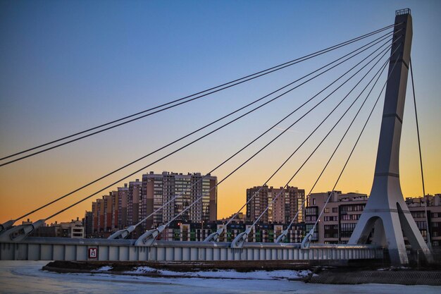 Suspension Bridge in the City at Sunset – Free Download