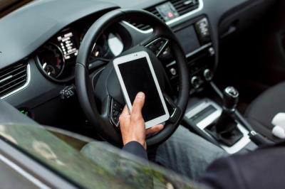 Driving Directions: Man Using Phone in Car – Free Stock Photo for Download