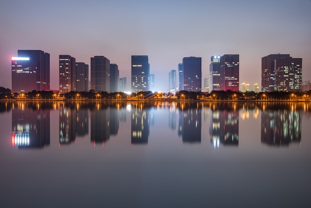 Buildings by Riverside Under Dramatic Sky – Free Stock Photo, Download for Free