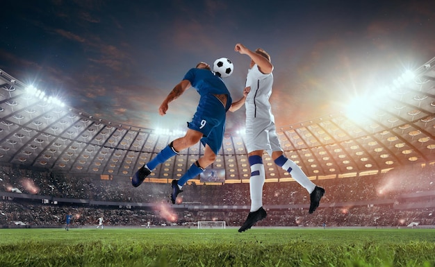 Action-Packed Soccer Players in a Professional Stadium – Free Download