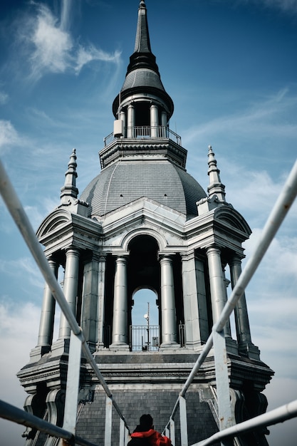 Vertical Low Angle Shot of a Building with a Steeple in Roubaix, France – Free Download