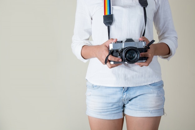 Girl Preparing Her Camera to Capture Stunning Shots – Free Download