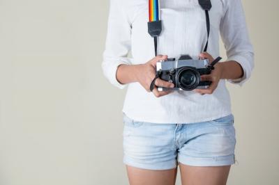 Girl Preparing Her Camera to Capture Stunning Shots – Free Download