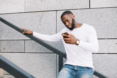 Smartphone User on Staircase – Free Stock Photo, Download for Free