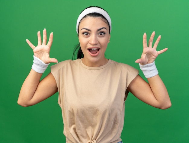 Sporty Girl in Headband Making Tiger Roar Gesture – Free to Download