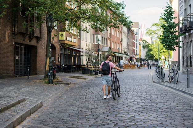 Young Sportsman Cycling in a European City | Free Stock Photo – Download for Free