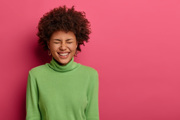 Overjoyed Afro American Woman Laughing at a Funny Joke – Free Download