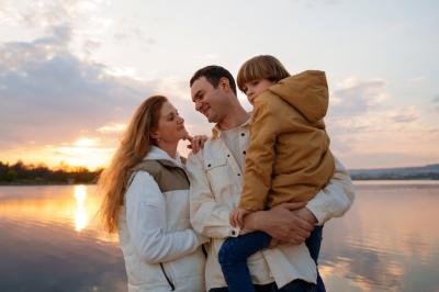 Family Enjoying Time on a Jetty – Free Download