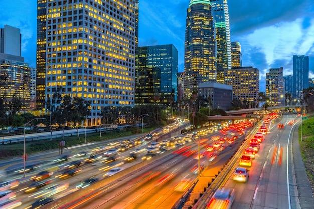 Dawning Urban Energy: Stunning 4K Image of Los Angeles Downtown and Morning Traffic at Sunrise – Free Download