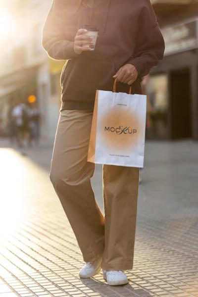 Woman Holding Shopping Bag Outdoors – Free Stock Photo Download