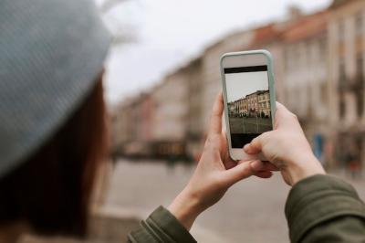 Young Woman Capturing Moments with Her Phone – Free Stock Photo, Download Free